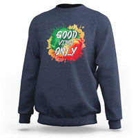 Navy crewneck sweatshirt with colorful “Good Vibes Only” rasta graphic on front