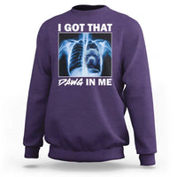 Men's purple sweatshirt with blue x-ray pitbull graphic and "DAWG IN ME" text