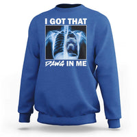 Men's royal blue sweatshirt with blue x-ray pitbull graphic and "DAWG IN ME" text