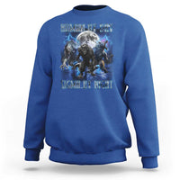 Royal blue crewneck sweatshirt with wolf graphic and moon text, long sleeves