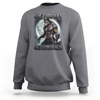 Charcoal crewneck sweatshirt with front wolf graphic design and ribbed cuffs.