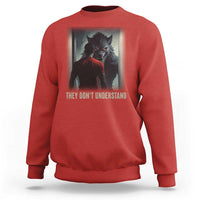 Red crewneck sweatshirt with wolf graphic and "They Don't Understand" print