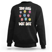 Black crewneck sweatshirt with colorful dot-face graphic and 'YOU ARE DOT DAY' print.
