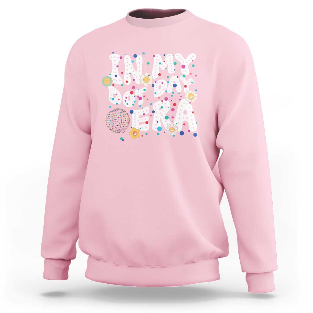 Light pink crewneck sweatshirt with colorful 'Happy Dot Day' graphic front