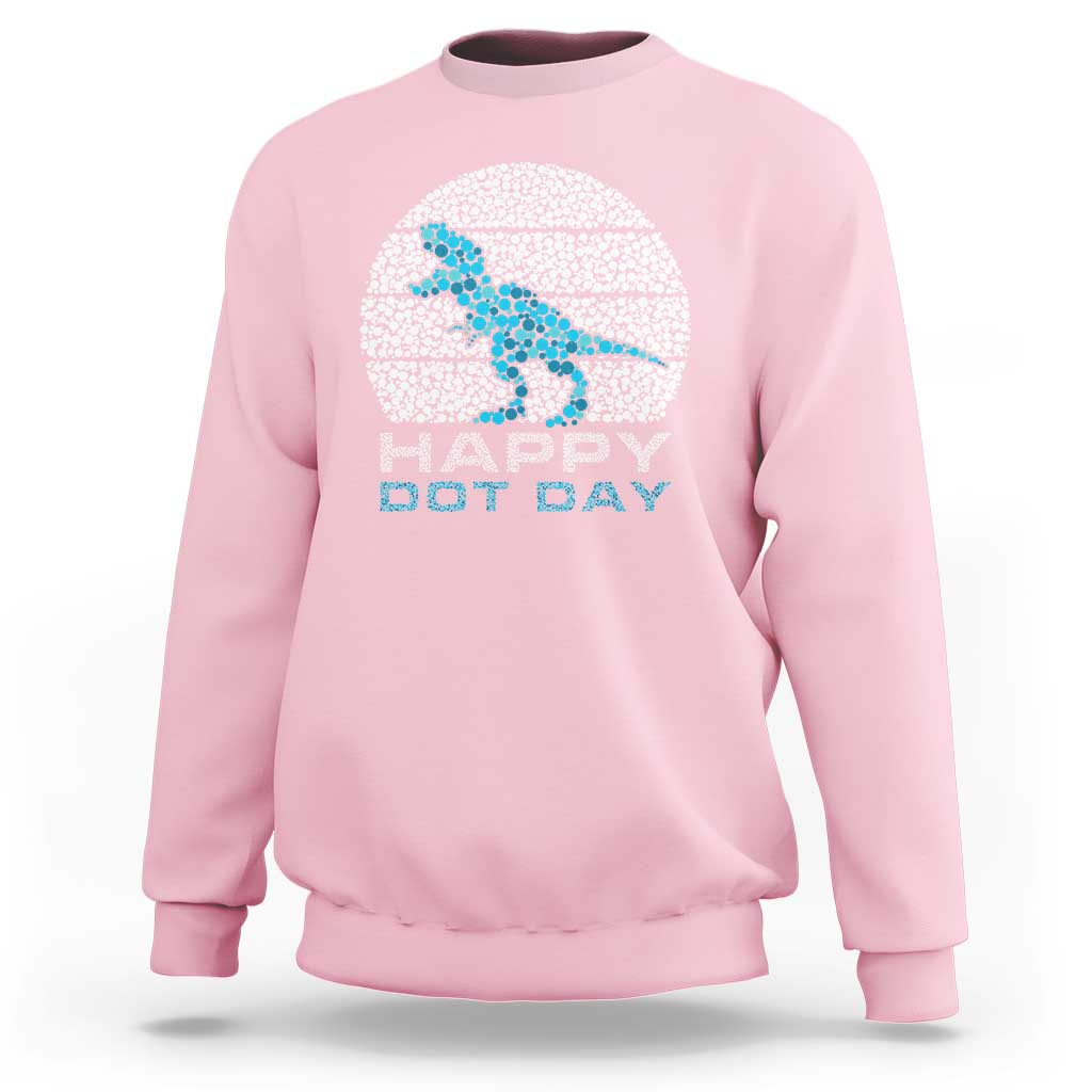 Light pink dinosaur sweatshirt with blue dot 'Happy Dot Day' graphic, crewneck