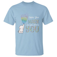 Light blue dot graphic T-shirt with white elephant and colorful “Make Your Mark” text
