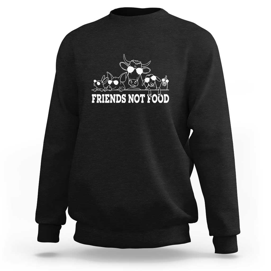 Black crewneck sweatshirt with white "Friends Not Food" graphic, long sleeves