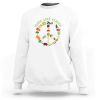 White sweatshirt with colorful “peace love veggies” vegetable wreath graphic