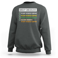 Dark heather gamer sweatshirt with “Daily Checklist” and play video game checklist graphic