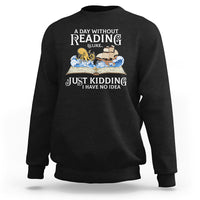 Black sweatshirt with front book-themed graphic text design, crew neck, long sleeves.