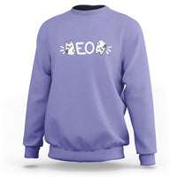 Violet purple sweatshirt with cat “EO” graphic, crew neck, long sleeves.
