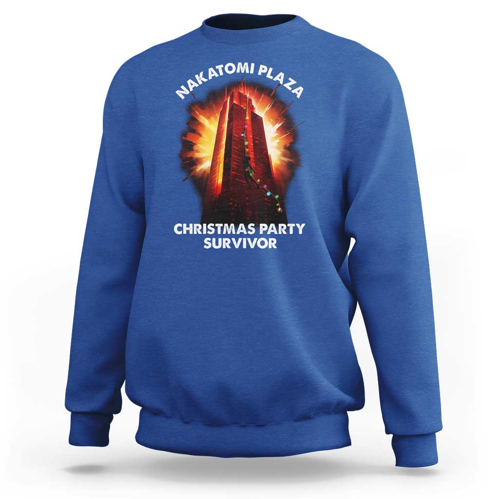 Royal blue sweatshirt with front “Christmas Party Survivor” graphic and NAKATOMI PLAZA logo