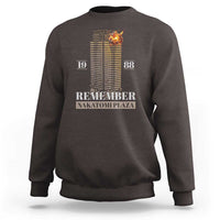 Dark chocolate crewneck sweatshirt with back print: "Remember Nakatomi Plaza" and "19 88"