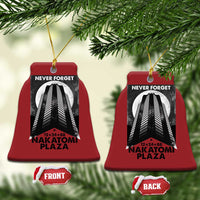 Red bell-shaped Christmas ornaments with building graphic and “Never Forget Nakatomi Plaza”