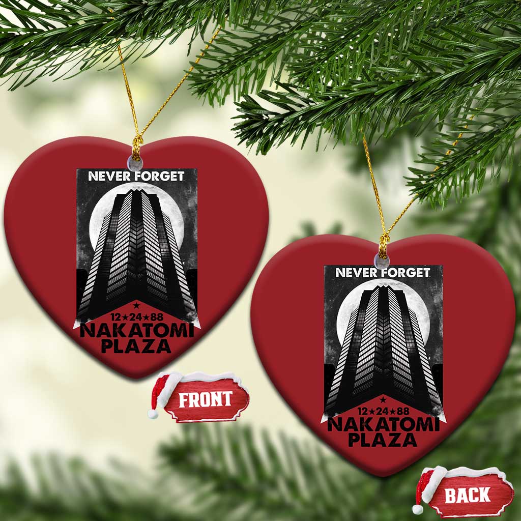 Red heart-shaped Christmas ornaments with building graphic and “Never Forget Nakatomi Plaza”