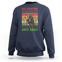 Navy crewneck sweatshirt with festive back graphic print and ribbed cuffs.