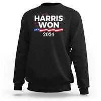 Black crewneck sweatshirt with front “HARRIS WON 2024” graphic and stars stripes