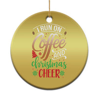 Gold round Christmas ornament with “I RUN ON Coffee and Christmas Cheer” text