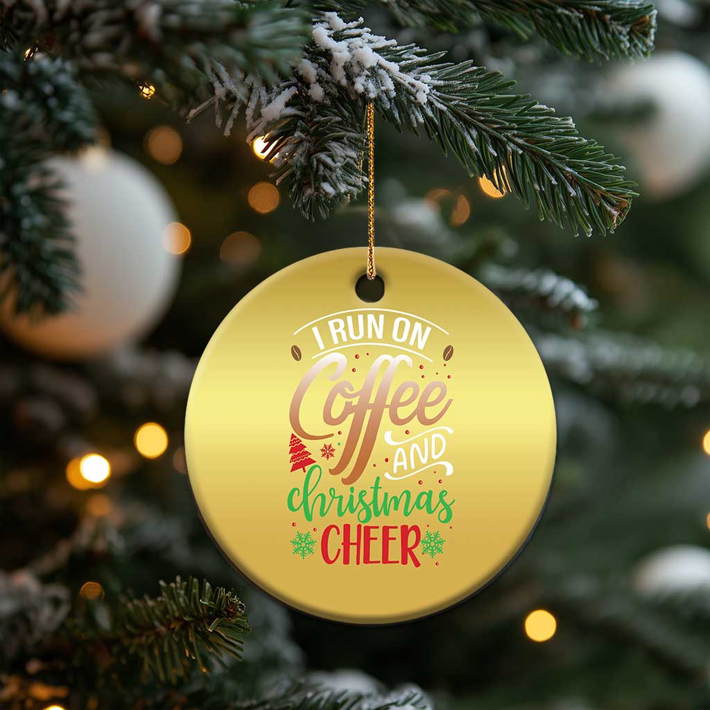 Gold round Christmas ornament hanging, “I RUN ON Coffee and Christmas Cheer”