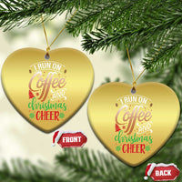 Gold heart-shaped Christmas ornament with “I RUN ON Coffee and Christmas Cheer”