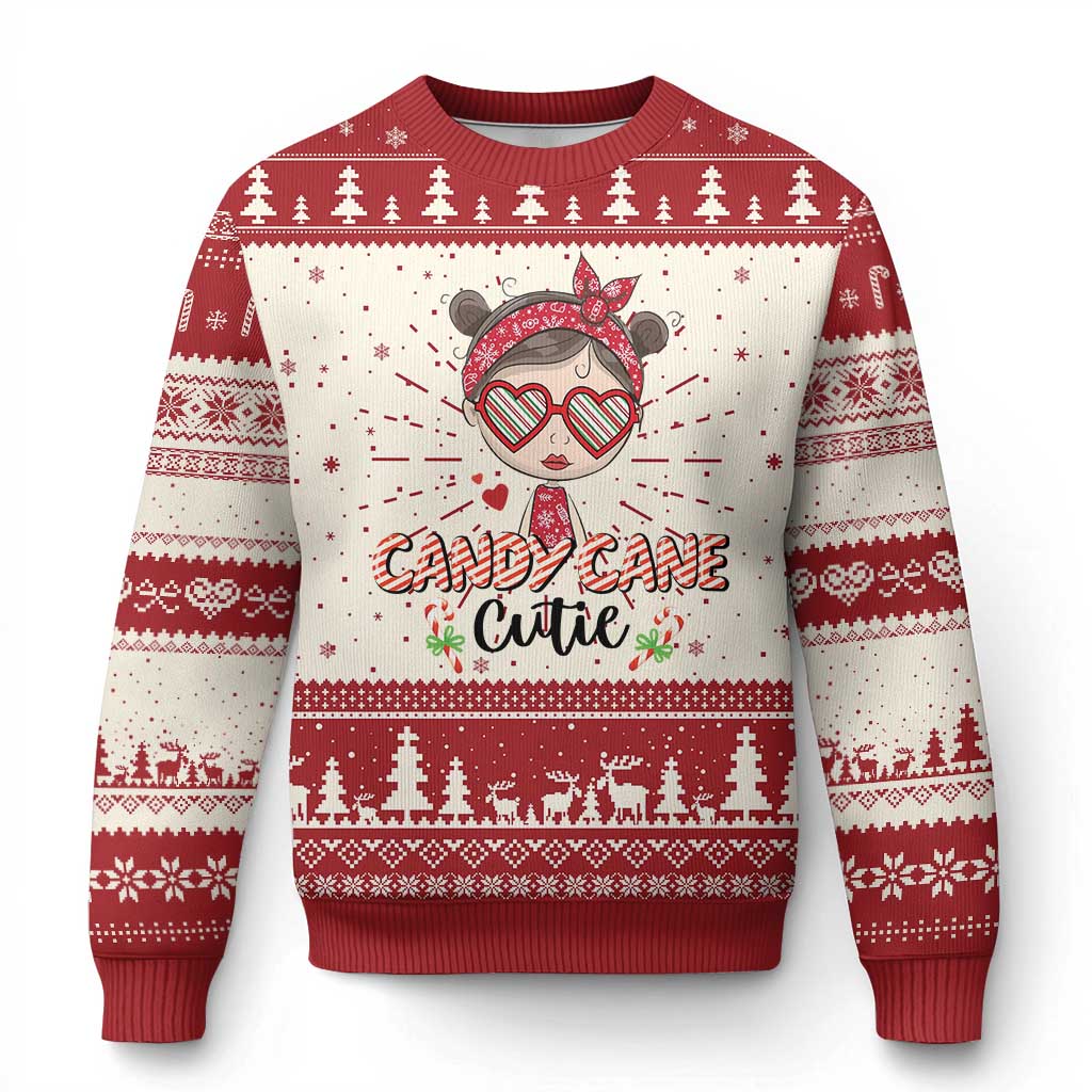 Red and cream Christmas sweater with cartoon girl graphic and fair isle trim