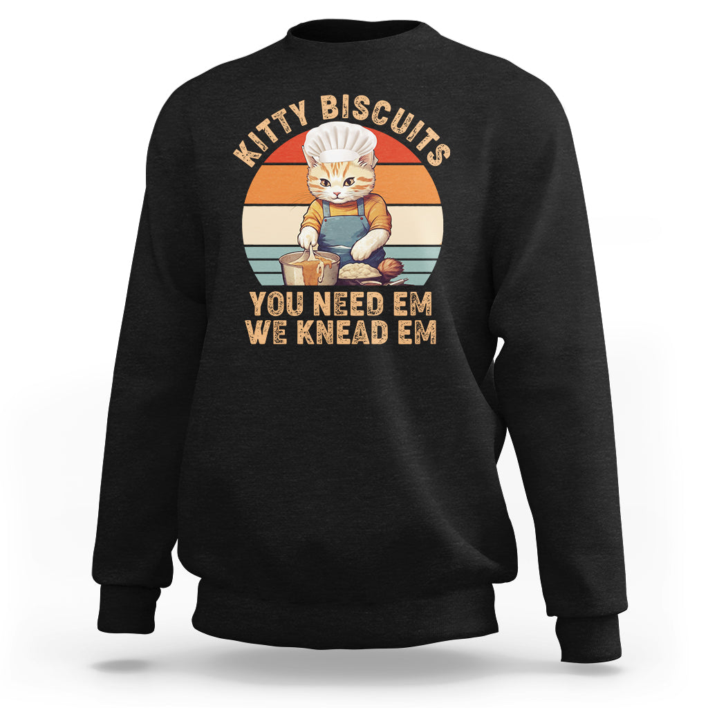 Black crewneck sweatshirt with vintage kitty graphic and striped badge on the chest.
