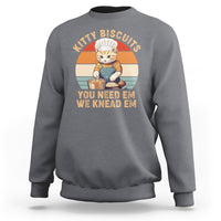 Charcoal crewneck sweatshirt with vintage kitty graphic and striped badge on the chest.