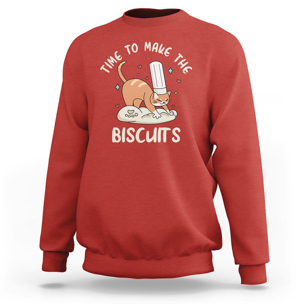 Red crewneck sweatshirt with cute cat holding a spatula and biscuit graphic on chest