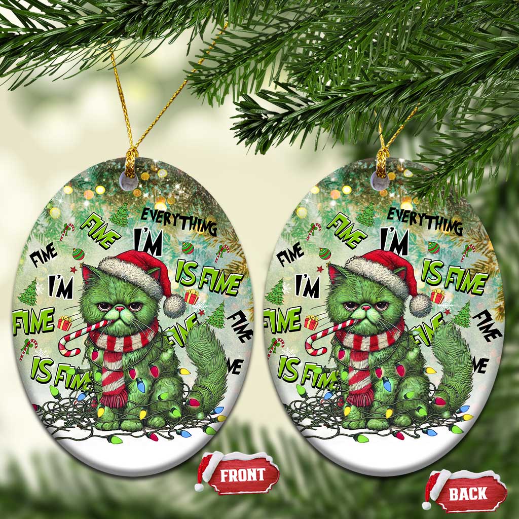 Two round green cat Christmas ornaments with Santa hat and “Everything I’m Fine Is Fine”