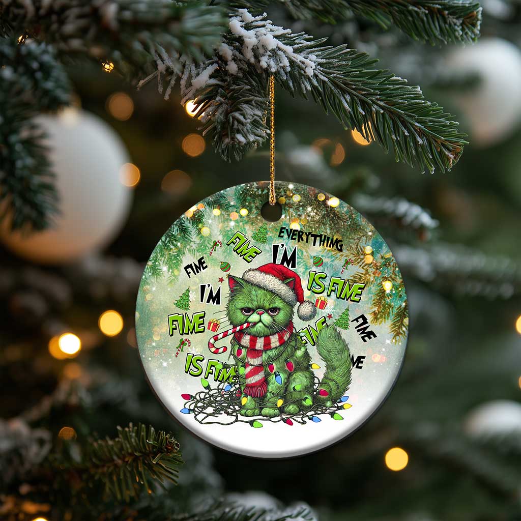 Round green cat Christmas ornament with Santa hat and “Everything I’m Fine Is Fine” text