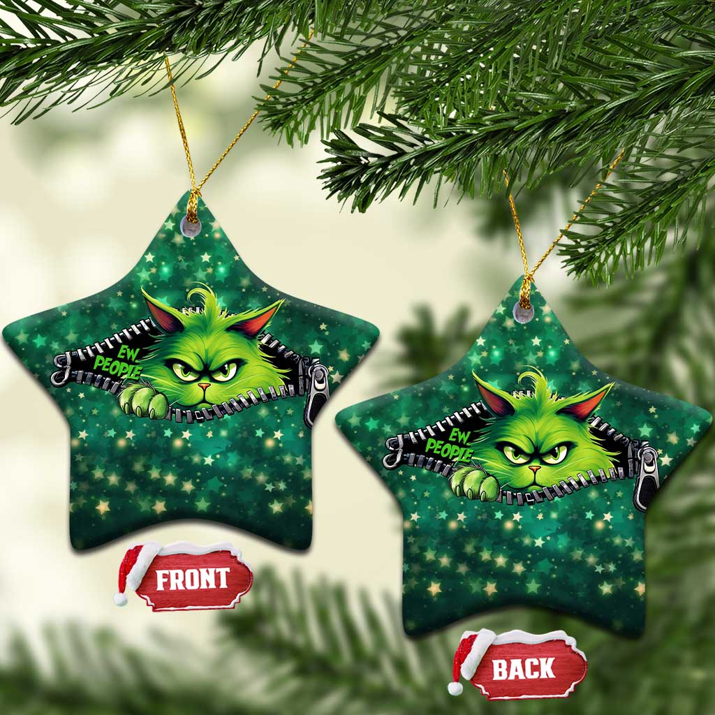 Green star-shaped cat Christmas ornament with neon cartoon cat face and zipper graphic.