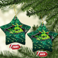 Green star-shaped cat Christmas ornament with neon cartoon cat face and zipper graphic.