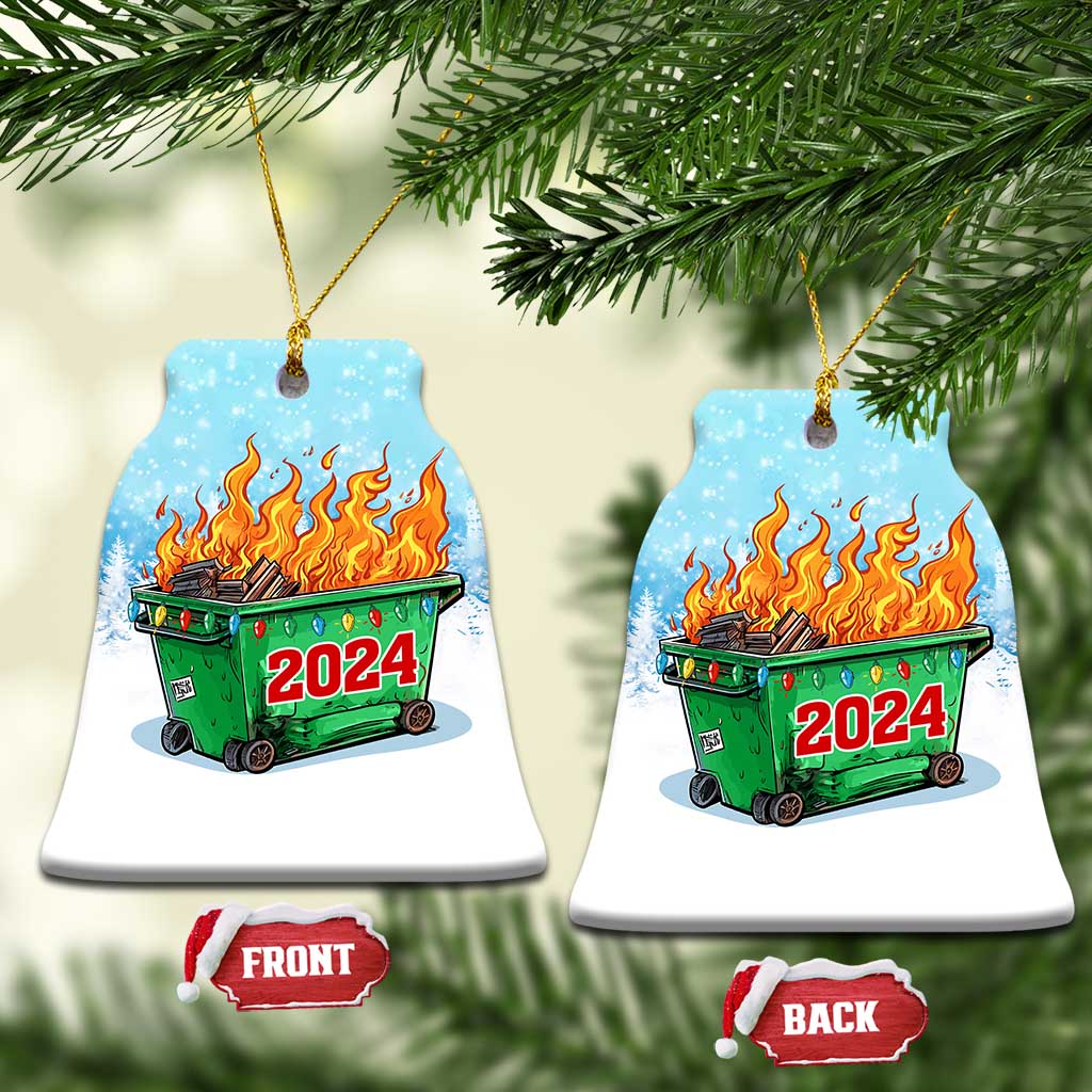 White bell-shaped ornament with blue snowy scene, green dumpster fire and red 2024.