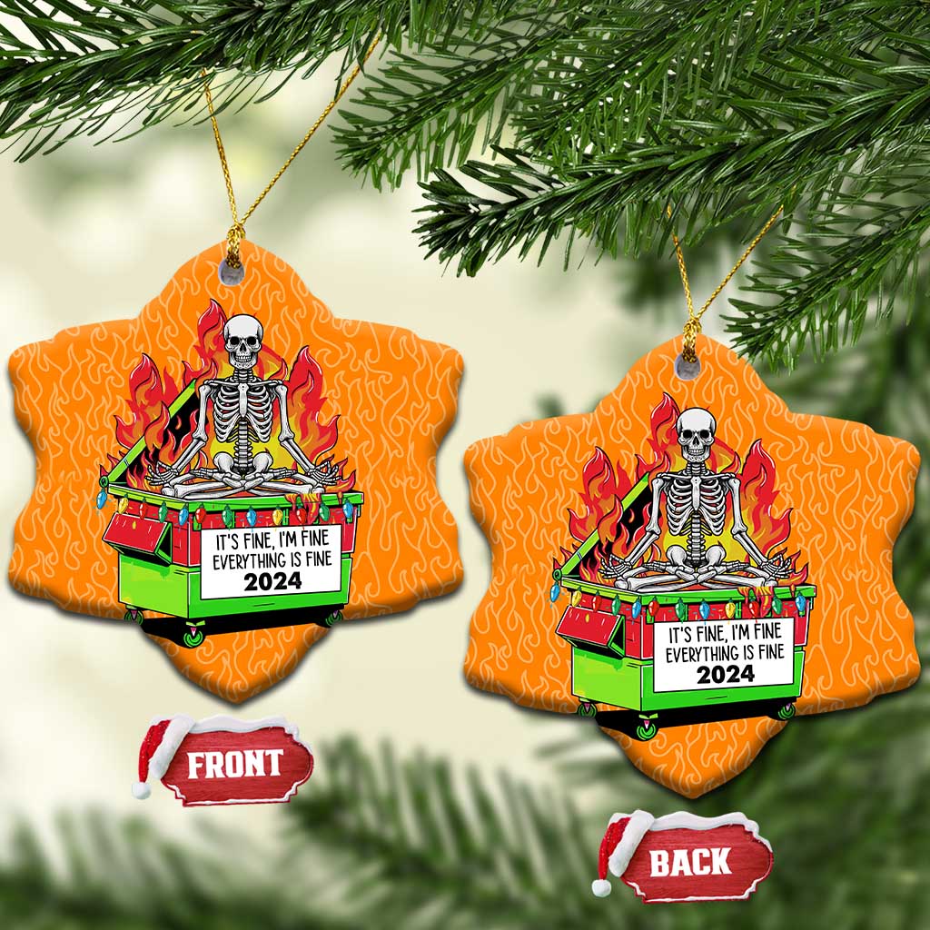 Orange heart-shaped Christmas ornaments with skeleton-in-flames dumpster artwork and front/back tags