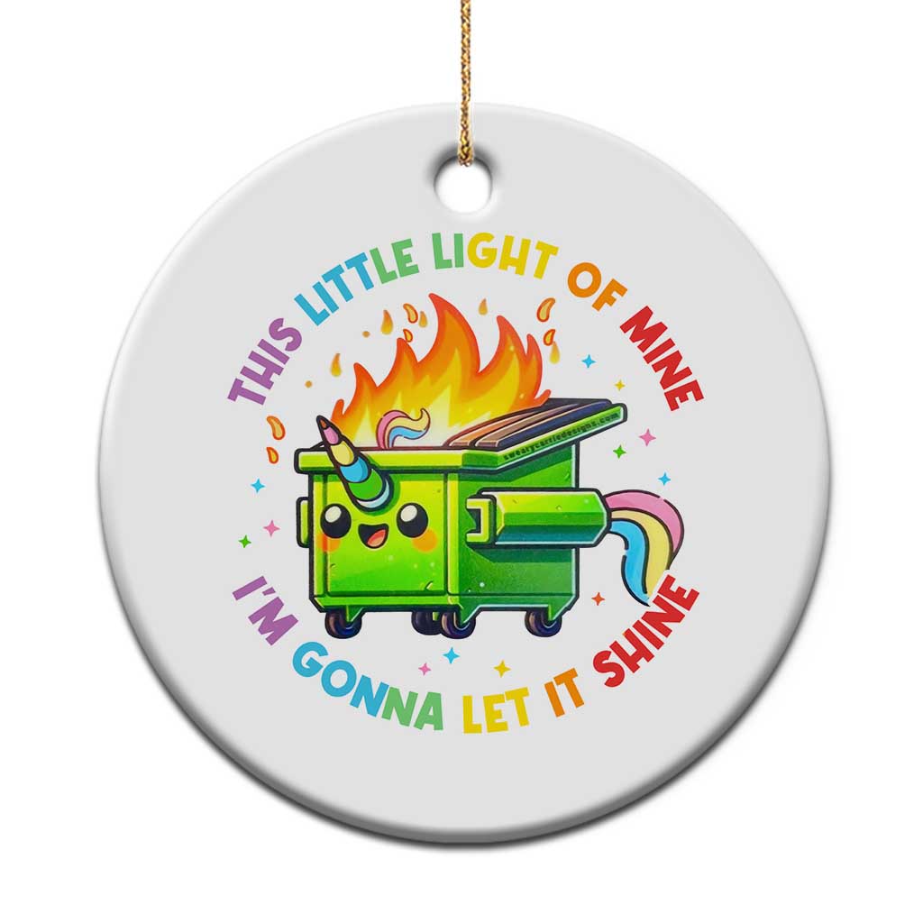 Round Christmas ornament with green fire truck illustration, flames, rainbow, gold hanging loop