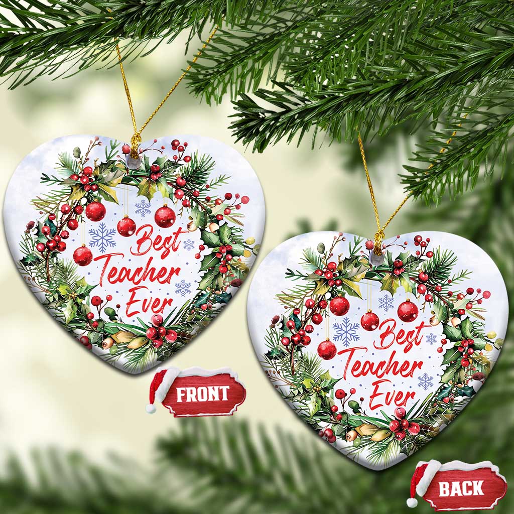 Heart-shaped Christmas ornament with “Best Teacher Ever” text, holly leaves, red berries, gold loop