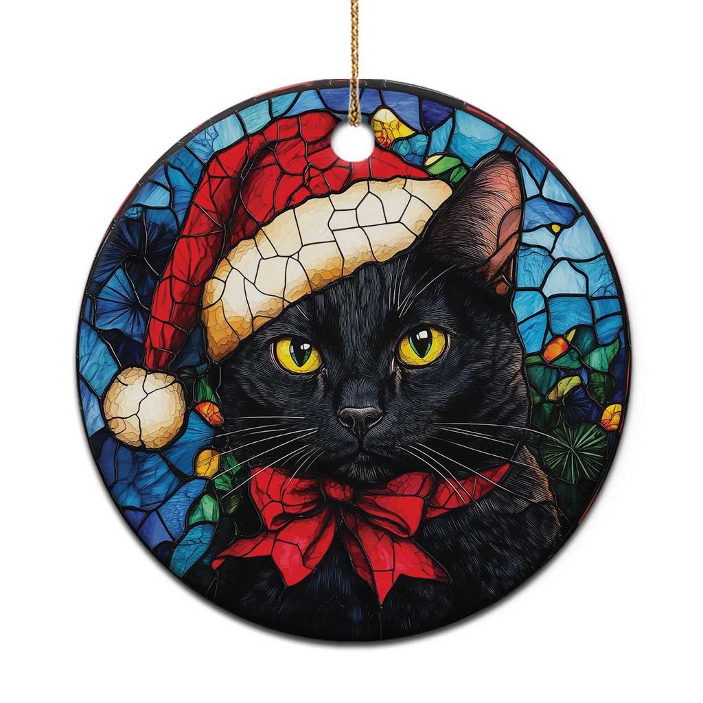 Round Christmas ornament with black cat in Santa hat and red bow on stained-glass style design