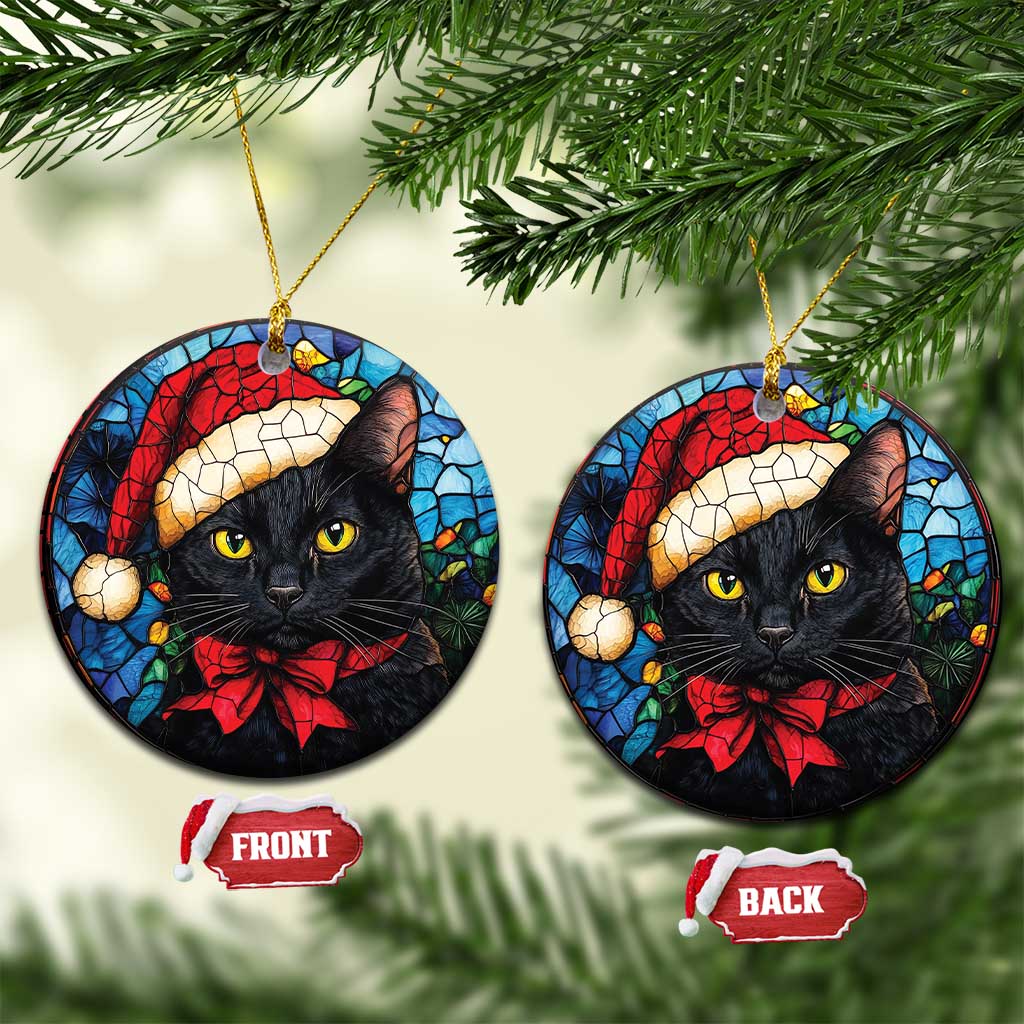 Pair of round Santa black cat ornaments with red bow, each hanging from a gold loop