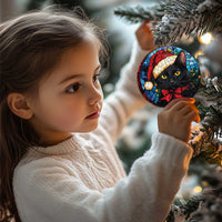Round Santa black cat ornament with red bow on stained-glass pattern, gold hanging loop