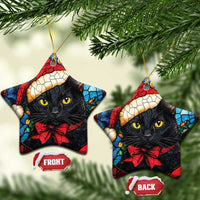 Star-shaped Christmas ornaments with black cat in Santa hat and red bow, gold hanging loops