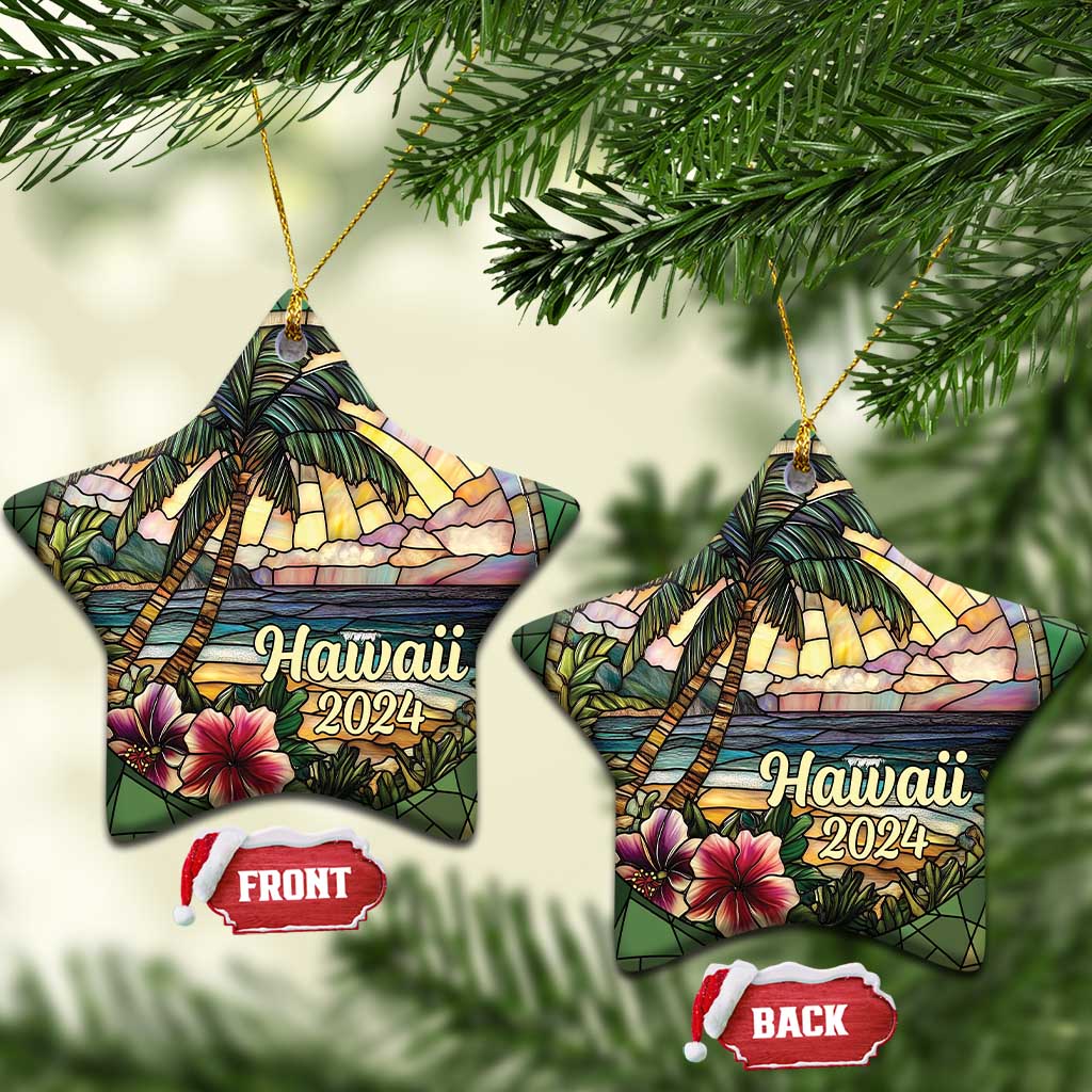 Hawaii 2024 star and heart ornaments hanging on gold cords with hibiscus and ocean