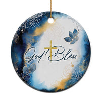 Blue and white round Christmas ornament with gold cross and God Bless text