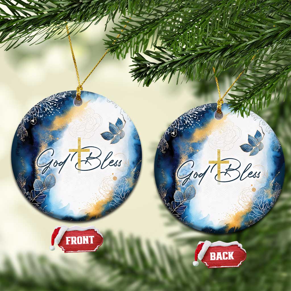 Set of two blue round ornaments on a tree, gold cross and God Bless design