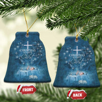 Blue bell-shaped Christmas ornaments with cross and 'Christmas begins with Christ' text