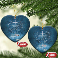 Blue heart-shaped ornaments with cross and 'Christmas begins with Christ' wording