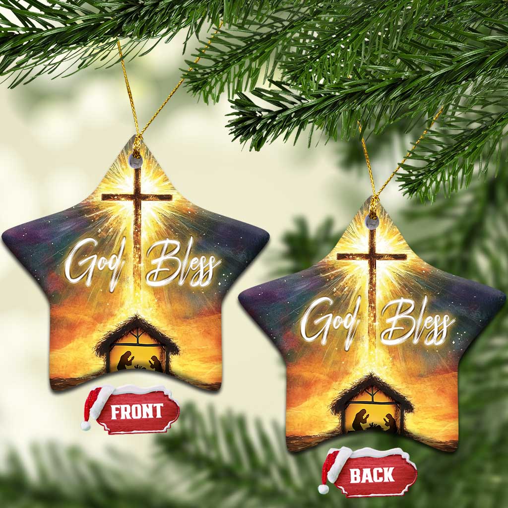Star nativity ornament with glowing cross, “God Bless,” and manger scene with front/back tags