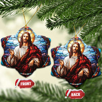 Two heart-shaped Jesus ornaments with stained-glass portrait and gold hanging cords