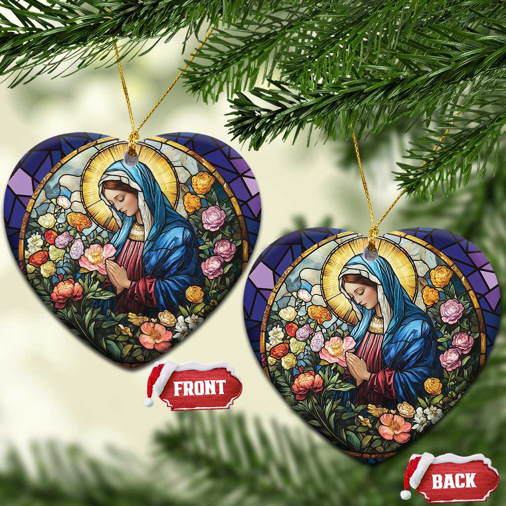 Heart and circle Christian Christmas ornaments showing Mary in blue robe among colorful flowers, gold loops