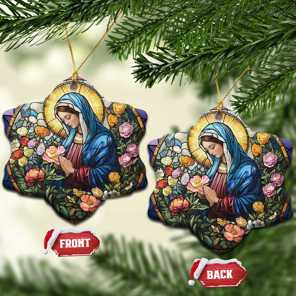 Two heart Christian Christmas ornaments with Mary in blue robe, colorful flowers, gold hanging loops
