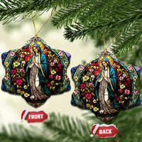Two heart-shaped Mary ornaments with gold hooks, colorful floral stained-glass design, front/back